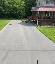 Country driveway before sealcoating
